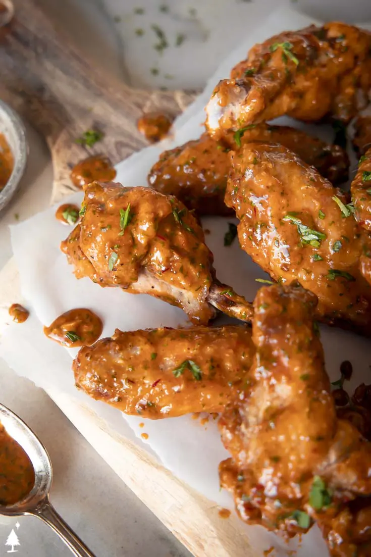 closer view of chipotle lime chicken wings on a platter