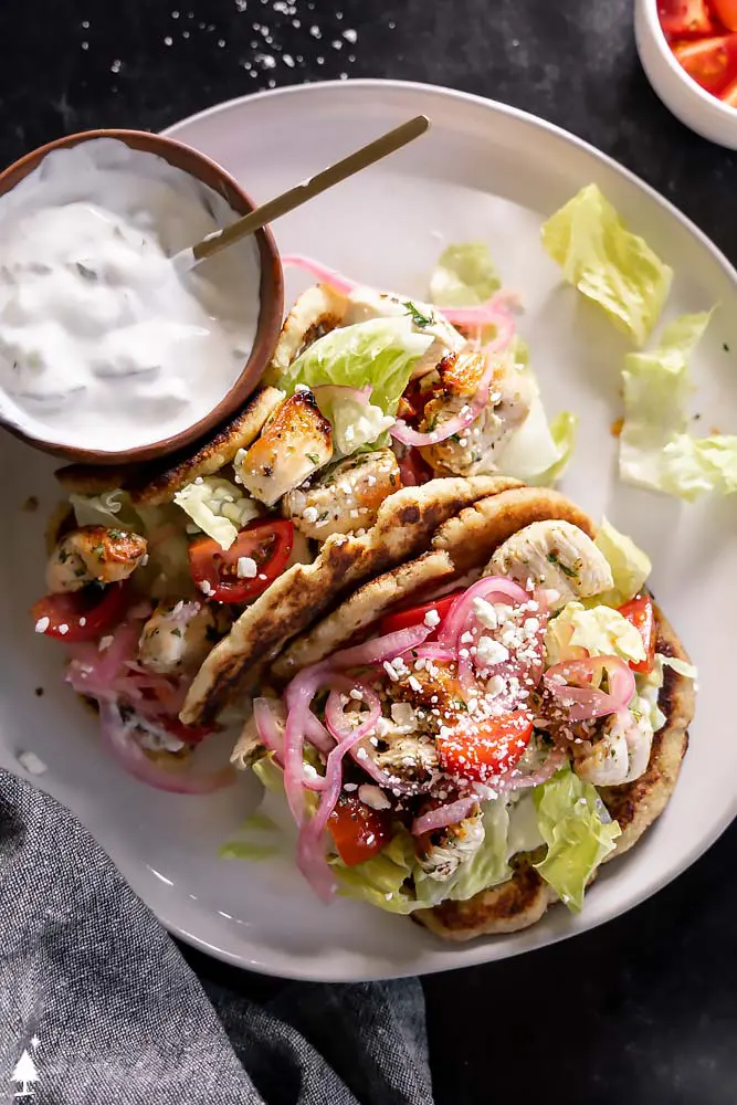 top view of chicken gyros on a plate 