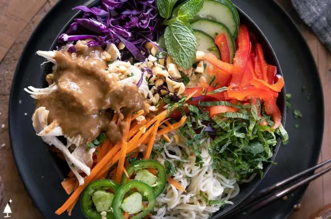 *NEW* Spring roll in a bowl combines all the best colors and flavors, then is tossed in a perfected peanut sauce. #ketospringrollinabowl #lowcarbspringrollinabowl