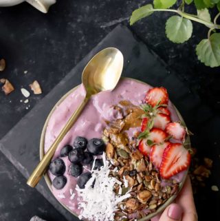 Keto Berry smoothie bowl served with berries and other toppings