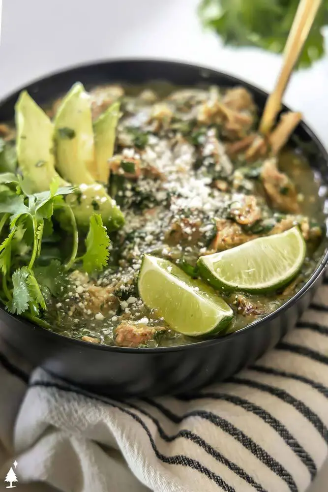 closer view of pork green chili in a bowl