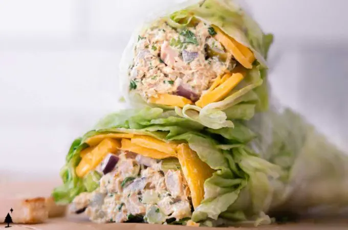 two pieces of best tuna salad in a lettuce wrap
