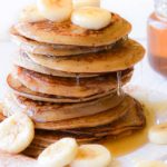 5 minutes + 3 ingredients are all you need for these super fluffy and delicious banana paleo pancakes! No almond flour or coconut flour required!