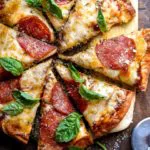 Top view of sliced fathead pizza