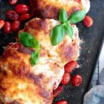 Lasagna stuffed chicken in a baking sheet