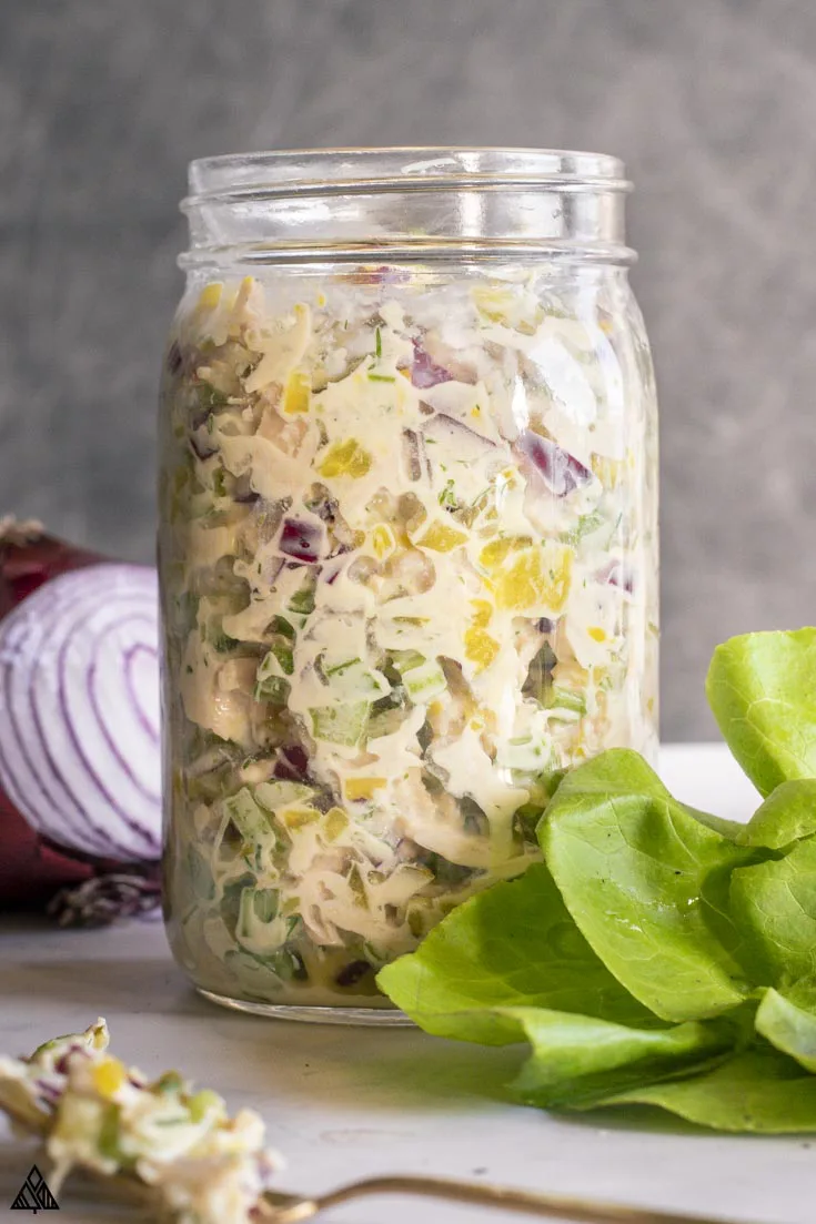 Chicken salad placed into a jar