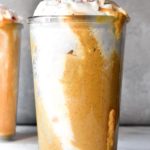 Closer look of a glass of pumpkin smoothie