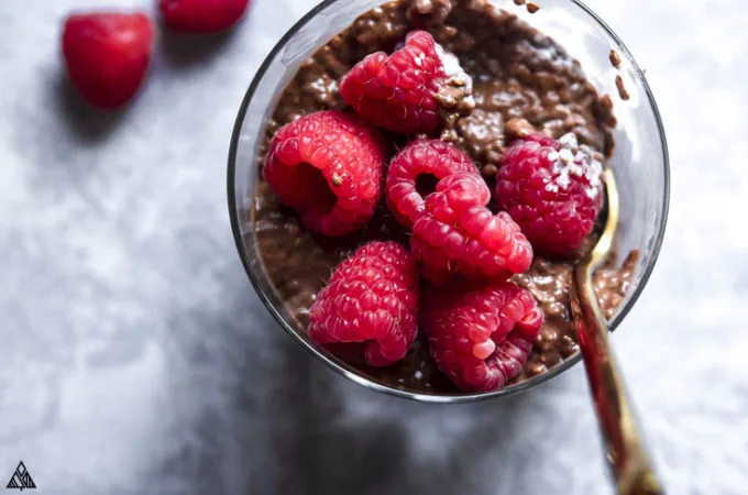 Top view of chocolate chia pudding topped with strawberries