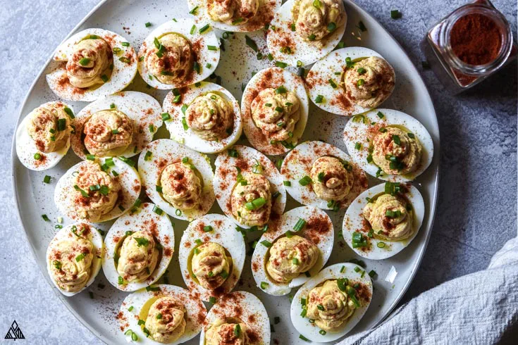 Deviled eggs without mayo in a plate