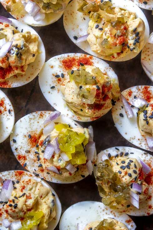 Deviled eggs with relish sprinkled with toppings