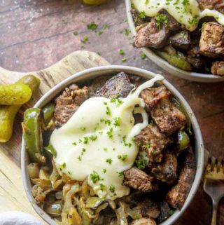 Top view of philly cheesesteak in a bowl