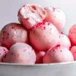 taking a bite out of strawberry cheesecake fat bombs