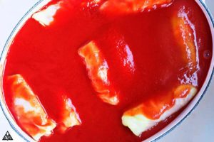 keto cabbage rolls covered in sauce