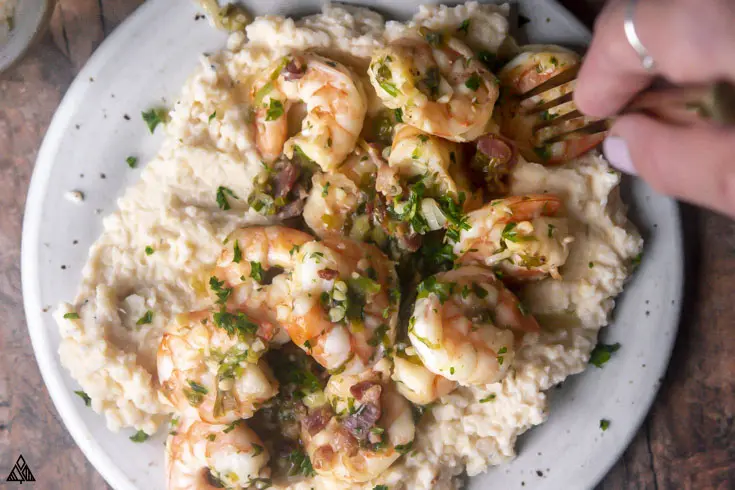 closer view of low carb grits and shrimp on a plate