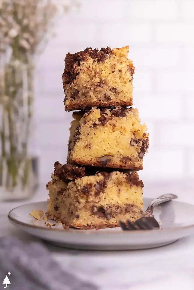 a stack of keto coffee cake slices on a plate