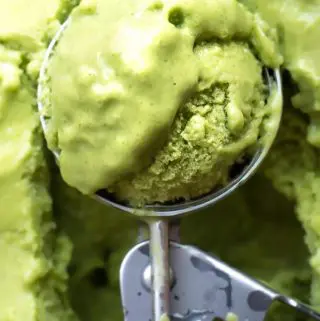 Keto avocado ice cream in an ice cream scooper