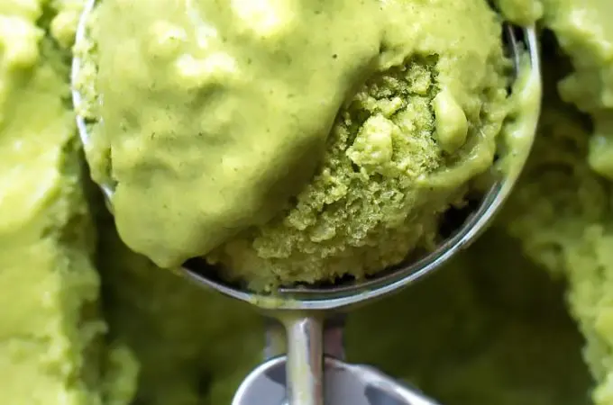 Keto avocado ice cream in an ice cream scooper