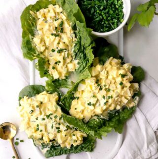 egg salad on a platter with chives