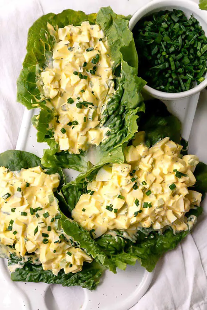 egg salad with extra chives in a lettuce wrap