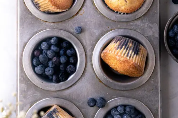 top view of keto blueberry muffins in a muffin pan
