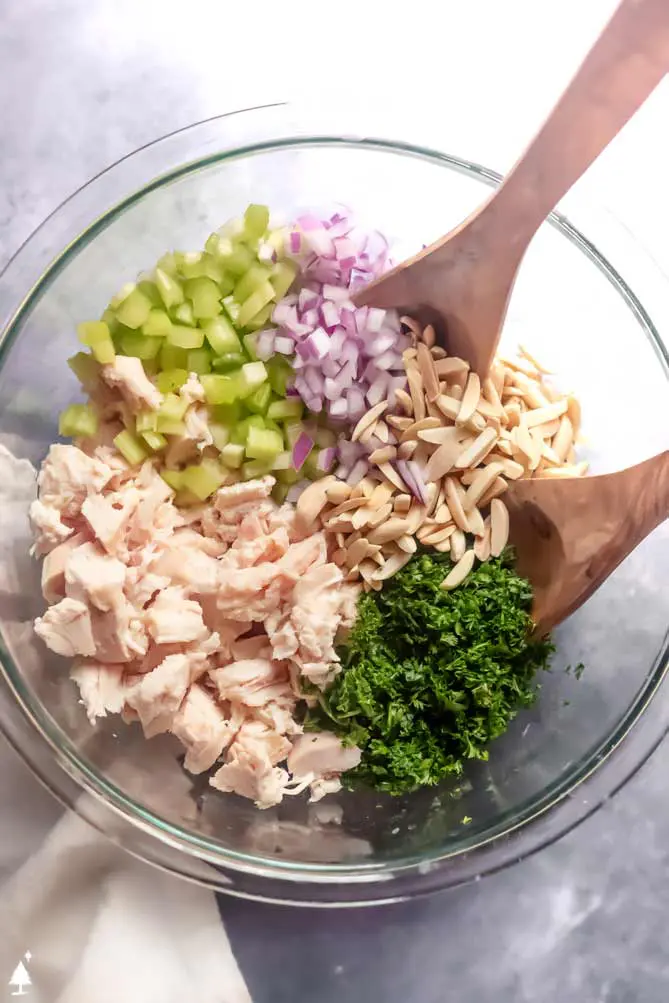 how to make chicken salad with the ingredients in a bowl together