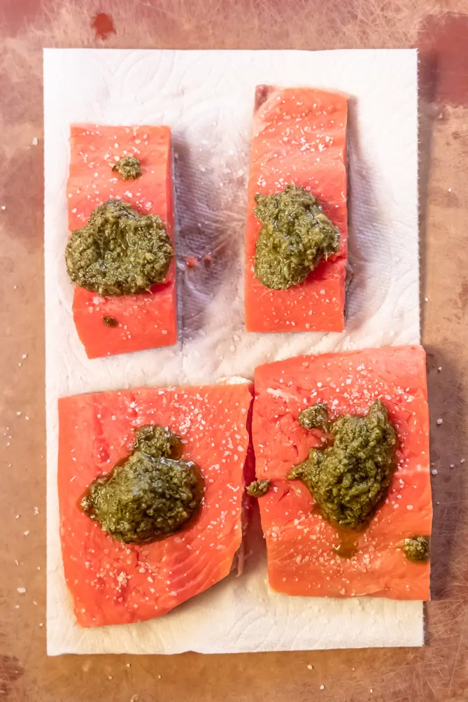 top view of pesto salmon baked