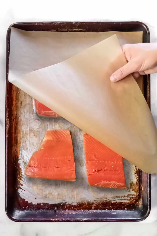 asian salmon recipe on a baking sheet pan