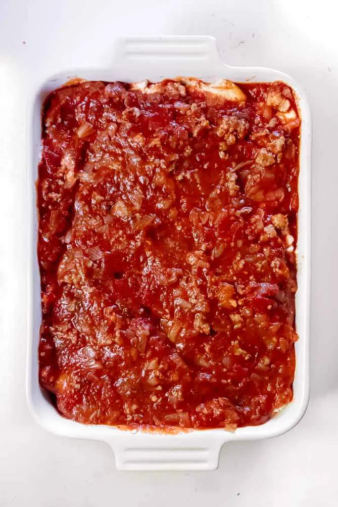 top view of cauliflower lasagna keto with remaining meat sauce
