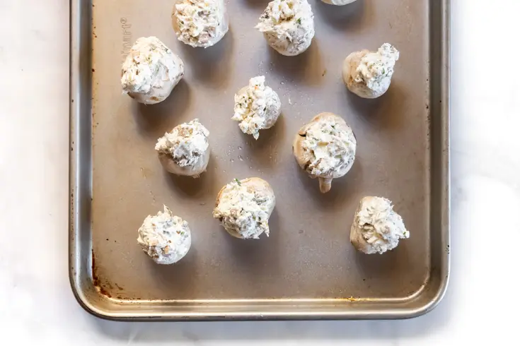 top view of easy stuffed mushrooms on a baking sheet 