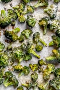 closer view of roasted broccoli with cheese