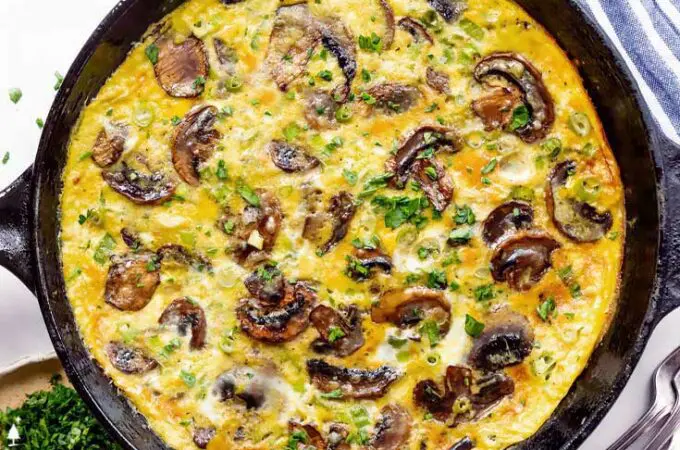 closer view of a mushroom frittata cast iron