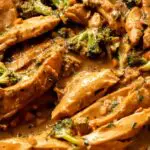 simmering easy peanut butter chicken in a pan