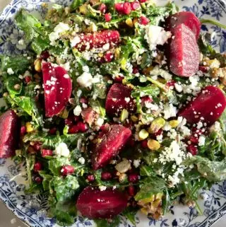 roasted beet salad recipe with goat cheese on a blue plate