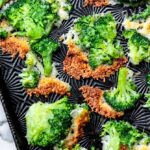 parmesan broccoli on a baking sheet