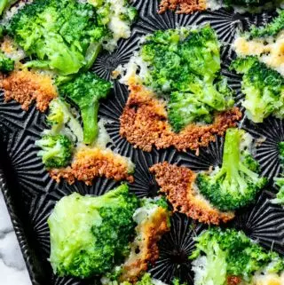 parmesan broccoli on a baking sheet