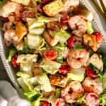 shrimp caesar salad on a platter