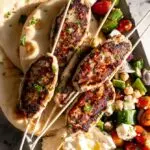 chicken kofta recipe on a platter with dip and bread