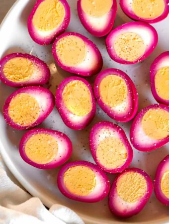 pickled eggs recipe on a plate with a napkin