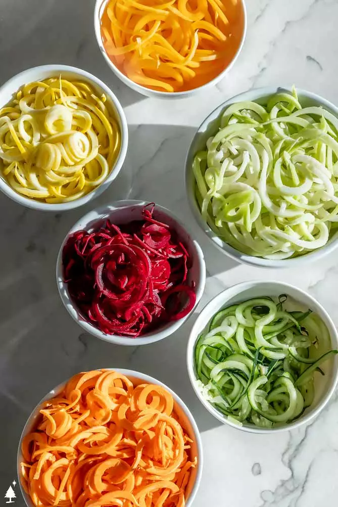 different varieties of vegetable noodles in bowls