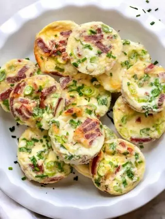 egg white muffins on a white platter